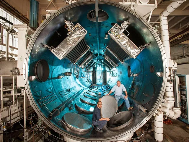 Photochemical deposition in the thermal-vacuum environment